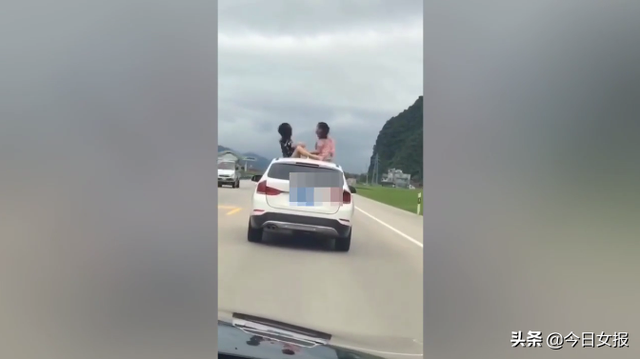 两妙龄女子宝马车顶划拳视频火了!不是“好嗨哟”是“超危险”!